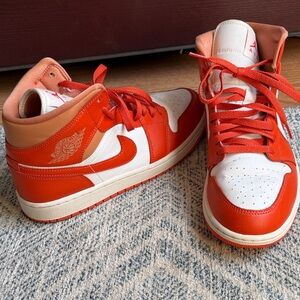 Nike Air Jordans / Orange and White High-Top Sneakers